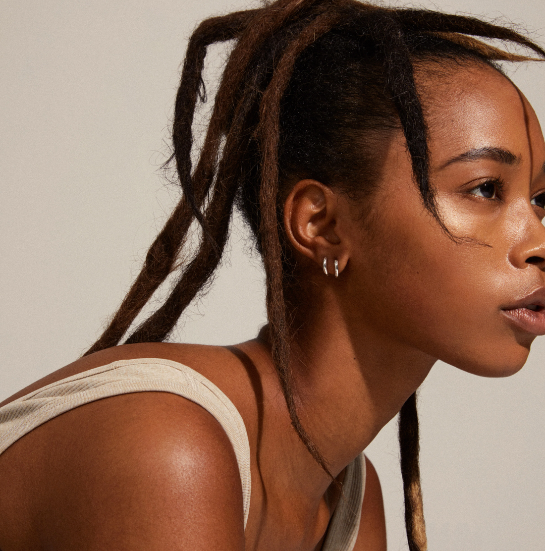 TYRA Small Hoop Huggie Earrings in Silver