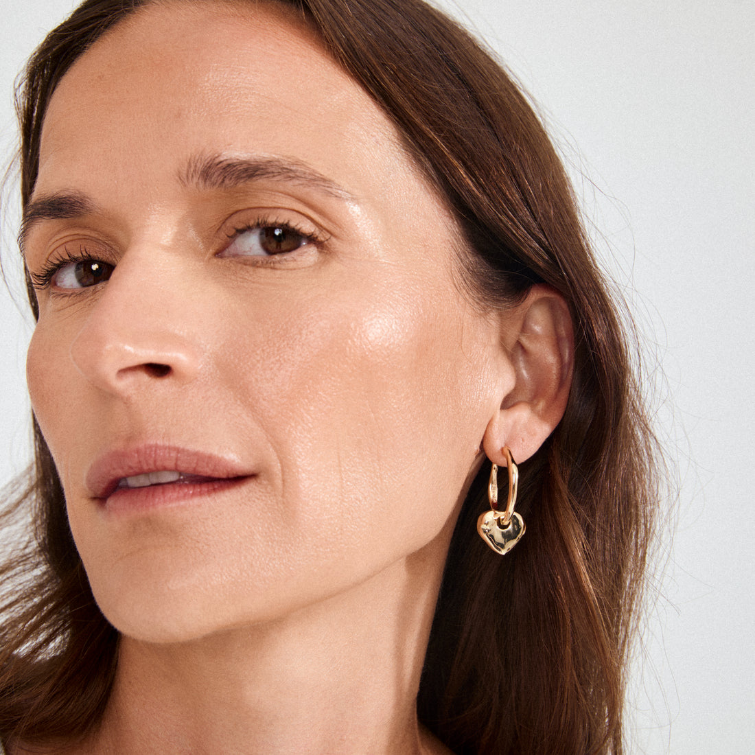 NOVA Gold Captured Heart Hoop Earrings