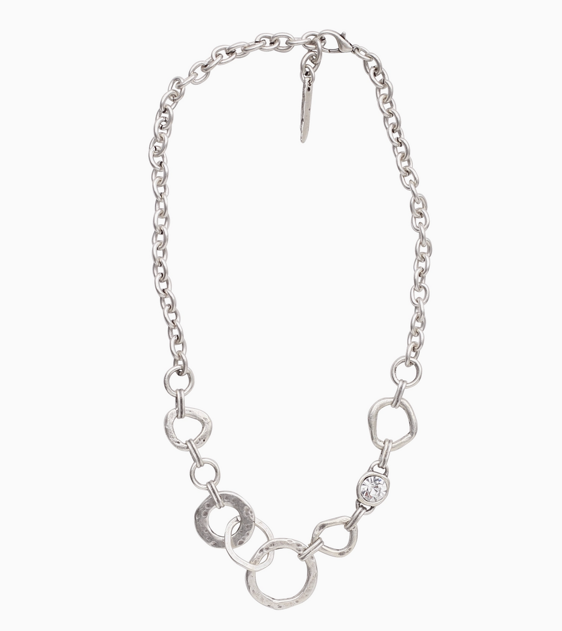 Suki’s Wardrobe Signature sculptural silver-plated boho necklace featuring a bold circle statement pendant.