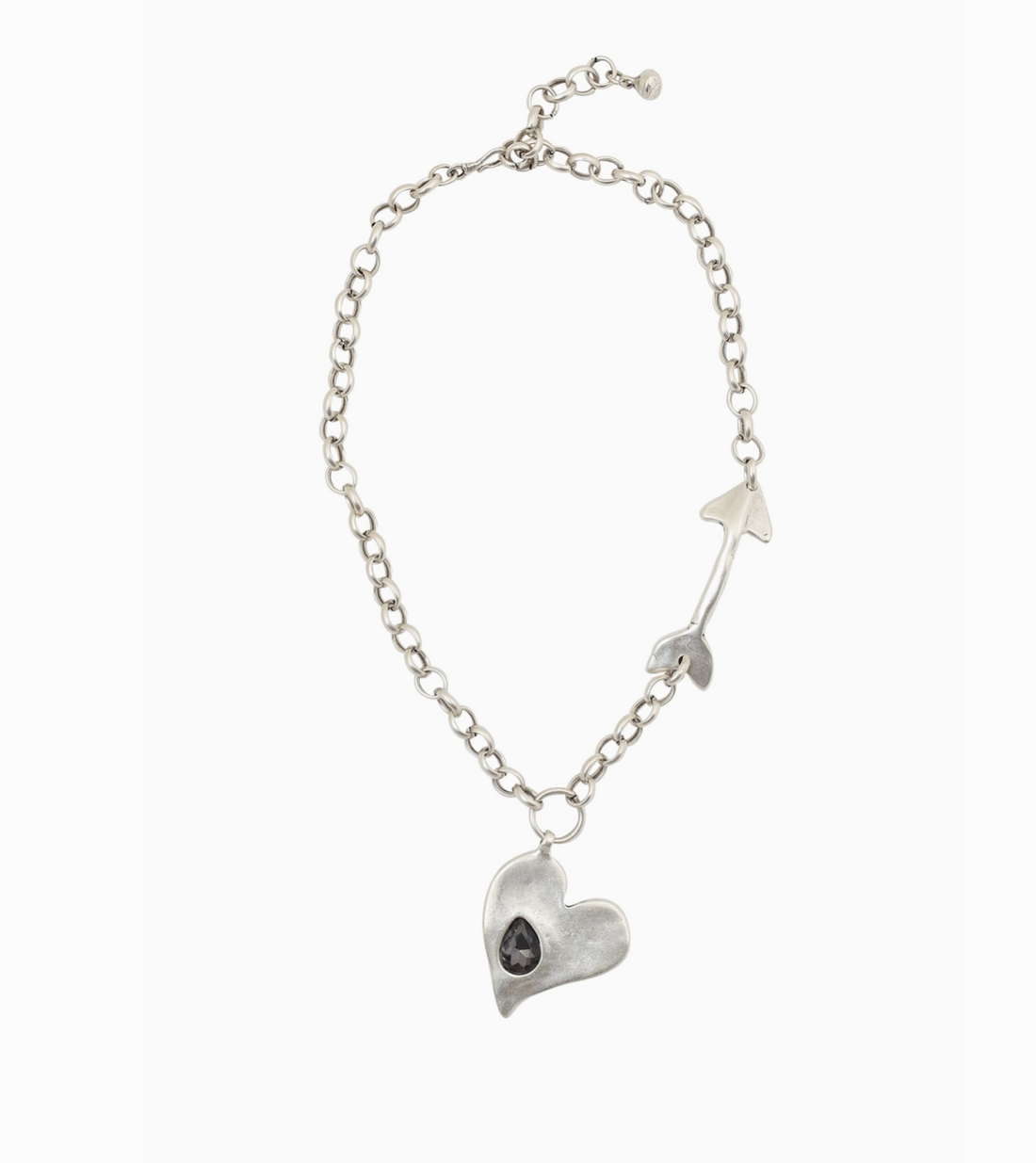 Zoomed out Angle of Suki’s Wardrobe silver adjustable statement boho style necklace featuring a sculptural heart and arrow pendants on a chunky chain.