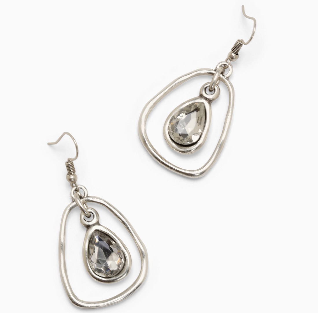 Abstract angle top view of Artisan-style Kira silver-plated organic sculptural earrings by Suki’s Wardrobe.